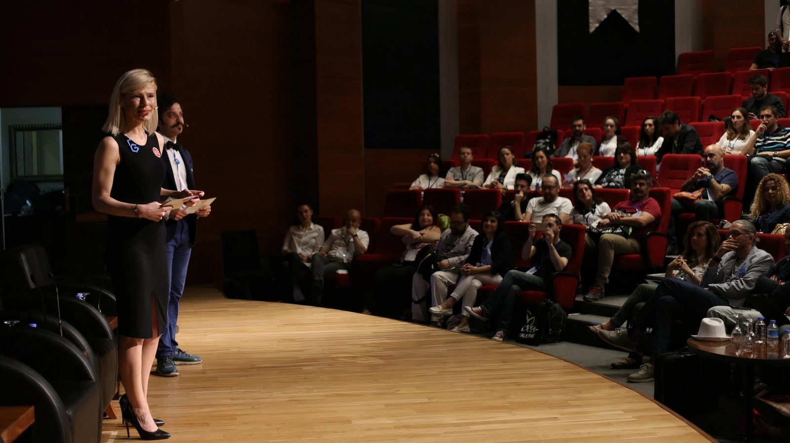 Funda Tabak speaking on stage